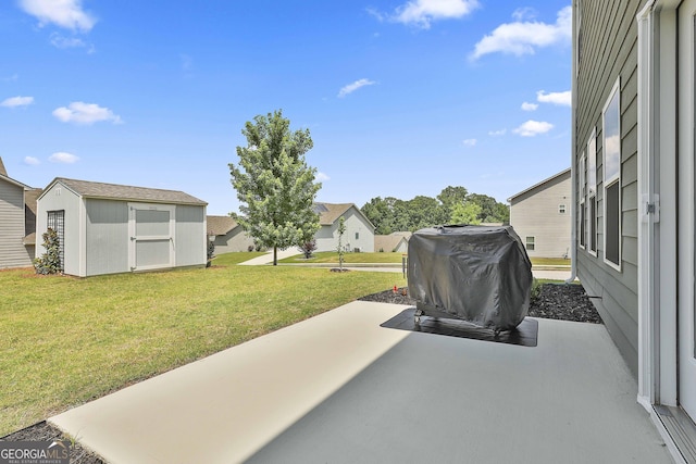 17 October Ave, Newnan, GA 30265 - view of patio featuring a storage shed, a grill, and a residential view