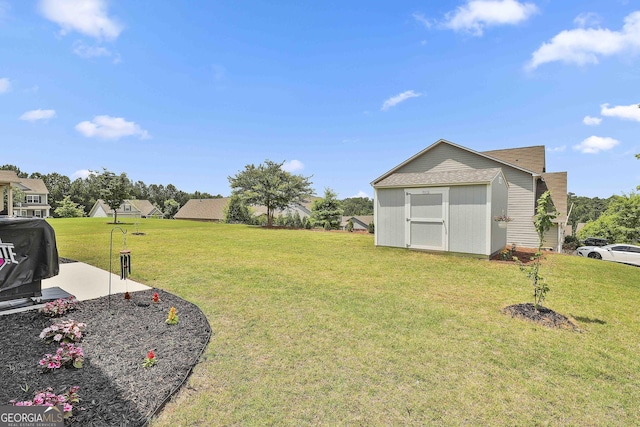 17 October Ave, Newnan, GA 30265 - view of grassy yard featuring a storage unit
