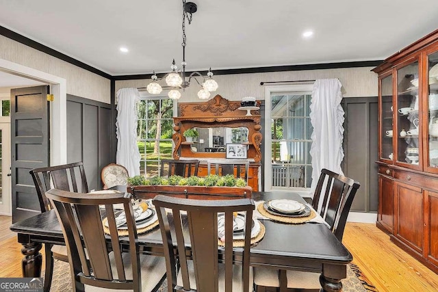 106 Draughons Dr, Saint Simons, GA 31522 - dining space with ornamental molding, light wood-style floors, and recessed lighting