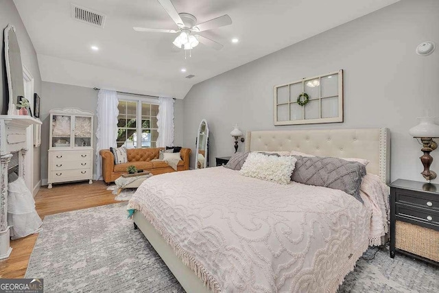 106 Draughons Dr, Saint Simons, GA 31522 - bedroom featuring wood finished floors, vaulted ceiling, recessed lighting, and a ceiling fan
