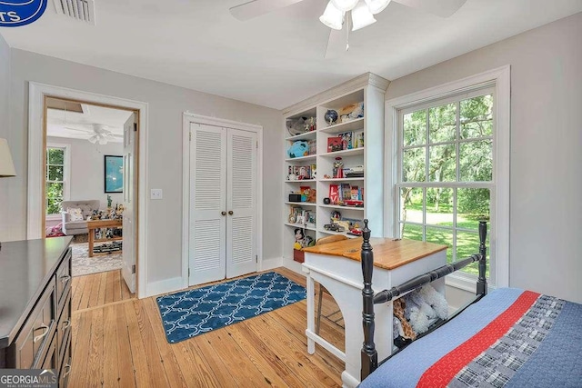 106 Draughons Dr, Saint Simons, GA 31522 - office with ceiling fan, light wood-style flooring, and plenty of natural light