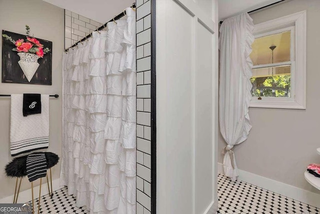106 Draughons Dr, Saint Simons, GA 31522 - bathroom featuring tile patterned floors and curtained shower