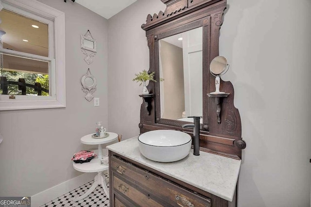 106 Draughons Dr, Saint Simons, GA 31522 - bathroom featuring baseboards and vanity