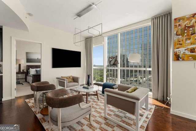 3325 Piedmont Rd NE Unit 2006, Atlanta, GA 30305 - living area featuring wood finished floors and floor to ceiling windows