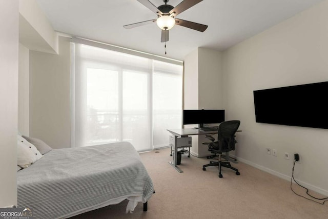 3325 Piedmont Rd NE Unit 2006, Atlanta, GA 30305 - bedroom featuring carpet floors, ceiling fan, and an office area