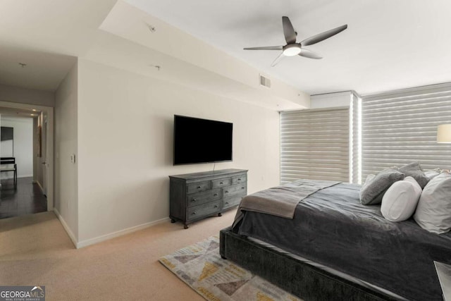 3325 Piedmont Rd NE Unit 2006, Atlanta, GA 30305 - bedroom featuring light carpet and a ceiling fan