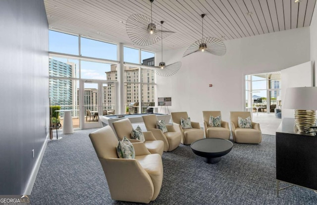 3325 Piedmont Rd NE Unit 2006, Atlanta, GA 30305 - building lobby featuring a towering ceiling, floor to ceiling windows, wooden ceiling, and a city view