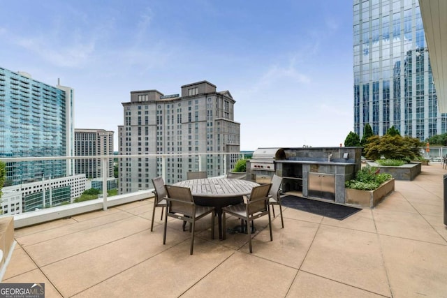 3325 Piedmont Rd NE Unit 2006, Atlanta, GA 30305 - view of patio with outdoor dining area, area for grilling, and a view of city