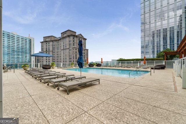 3325 Piedmont Rd NE Unit 2006, Atlanta, GA 30305 - community pool with a patio area