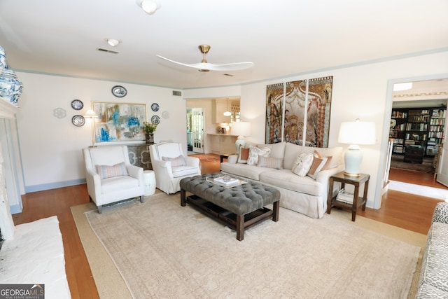 8 Crepe Myrtle, Newnan, GA 30263 - living area with wood finished floors and a ceiling fan