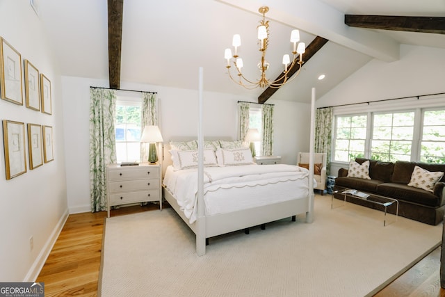 8 Crepe Myrtle, Newnan, GA 30263 - bedroom featuring a chandelier, multiple windows, and light wood-type flooring