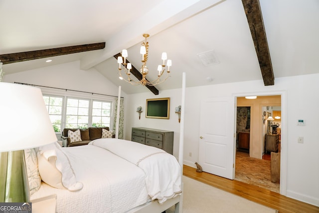 8 Crepe Myrtle, Newnan, GA 30263 - bedroom with wood finished floors and a chandelier
