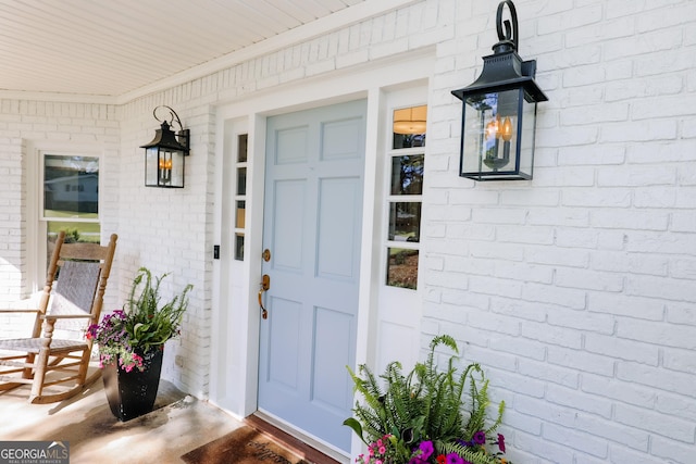 8 Crepe Myrtle, Newnan, GA 30263 - view of exterior entry featuring covered porch and brick siding