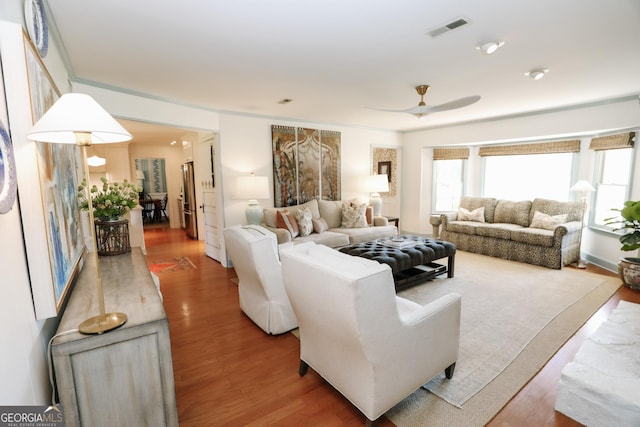 8 Crepe Myrtle, Newnan, GA 30263 - living room with wood finished floors and ceiling fan