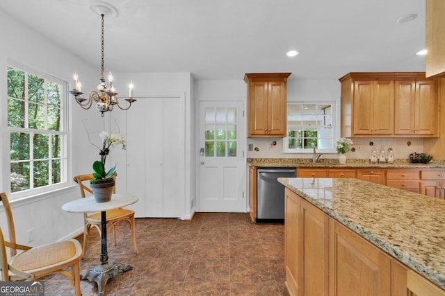 1590 Sunnybrook Farm Rd, Atlanta, GA 30350 - kitchen featuring dishwasher, a chandelier, light stone countertops, decorative backsplash, and hanging light fixtures