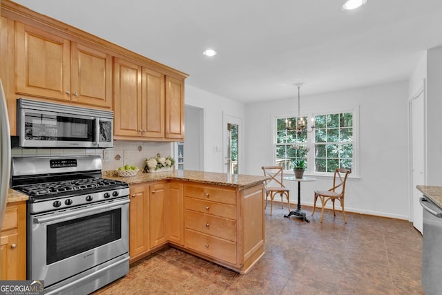 1590 Sunnybrook Farm Rd, Atlanta, GA 30350 - kitchen featuring appliances with stainless steel finishes, a peninsula, tasteful backsplash, recessed lighting, and light stone counters