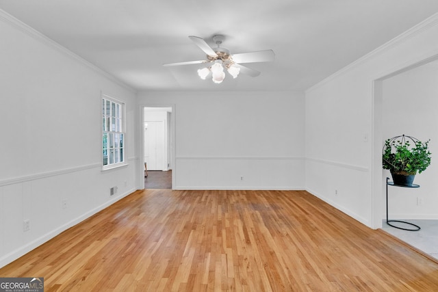 1590 Sunnybrook Farm Rd, Atlanta, GA 30350 - spare room with light wood-type flooring, ceiling fan, and crown molding