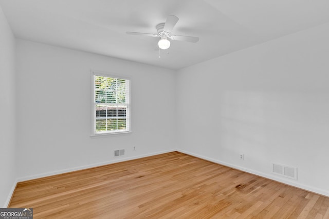 1590 Sunnybrook Farm Rd, Atlanta, GA 30350 - spare room with wood finished floors and ceiling fan