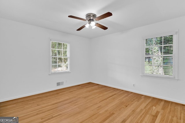 1590 Sunnybrook Farm Rd, Atlanta, GA 30350 - unfurnished room featuring light wood-style flooring and ceiling fan