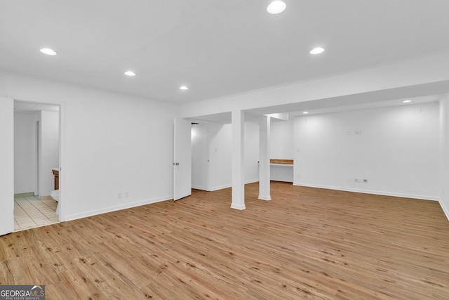 1590 Sunnybrook Farm Rd, Atlanta, GA 30350 - finished basement with light wood finished floors and recessed lighting