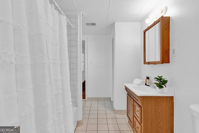 1590 Sunnybrook Farm Rd, Atlanta, GA 30350 - full bath featuring vanity, tile patterned floors, a shower with shower curtain, and a paneled ceiling