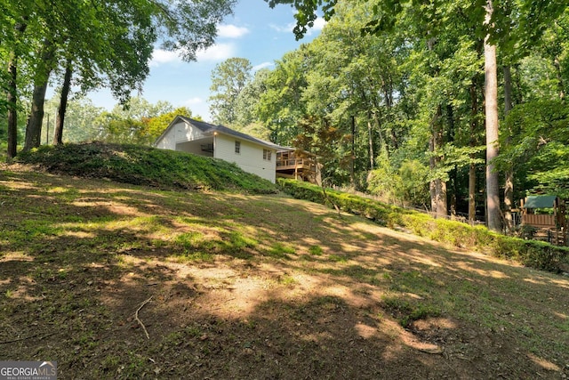 1590 Sunnybrook Farm Rd, Atlanta, GA 30350 - view of yard with a wooden deck