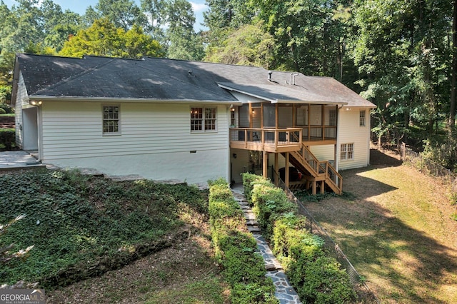 1590 Sunnybrook Farm Rd, Atlanta, GA 30350 - back of property with stairs, a sunroom, a wooden deck, and a shingled roof