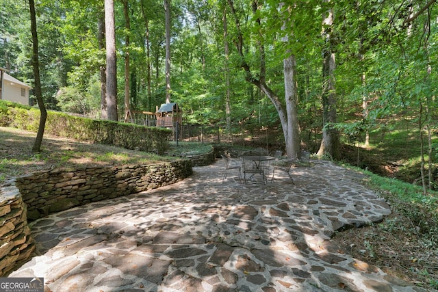 1590 Sunnybrook Farm Rd, Atlanta, GA 30350 - view of patio / terrace featuring a playground and outdoor dining space