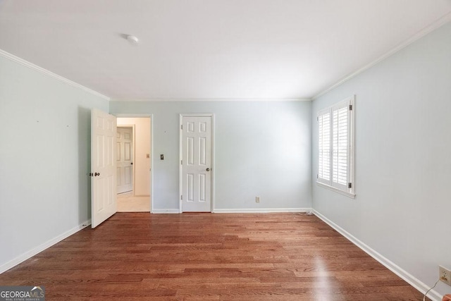 205 Castlegate Rd, Macon, GA 31210 - spare room featuring crown molding and wood finished floors