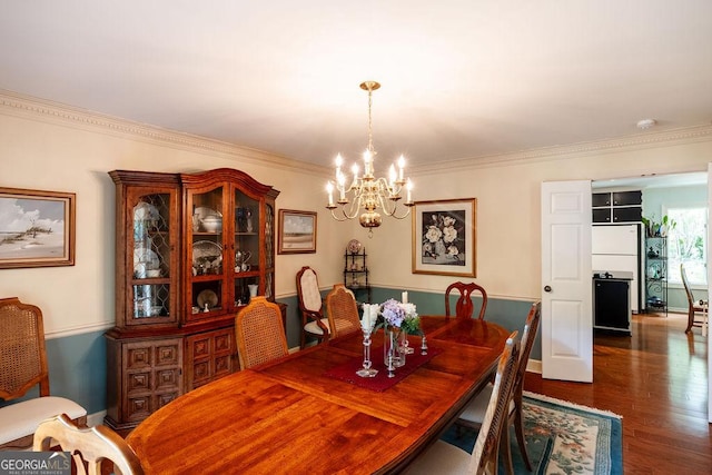 205 Castlegate Rd, Macon, GA 31210 - dining area featuring a chandelier, wood finished floors, and ornamental molding