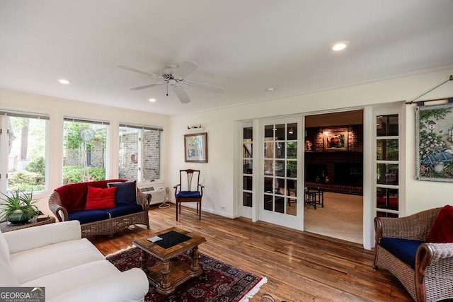 205 Castlegate Rd, Macon, GA 31210 - living room with a ceiling fan, wood finished floors, and recessed lighting