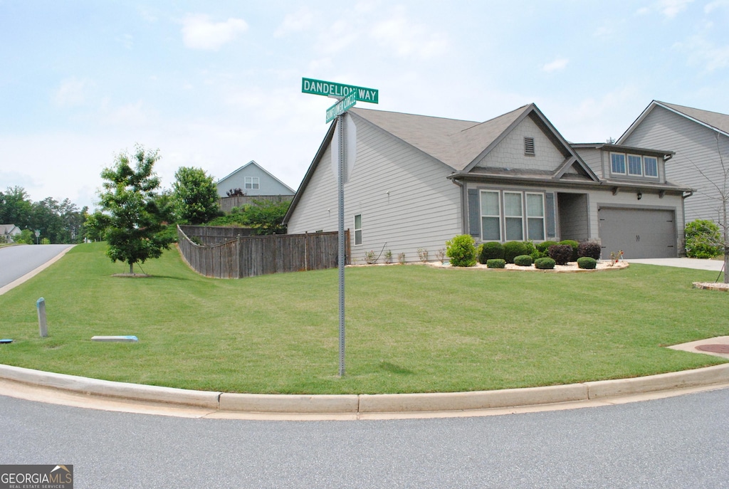 4605 Dandelion Way, Cumming, GA 30040 - view of side of home with concrete driveway