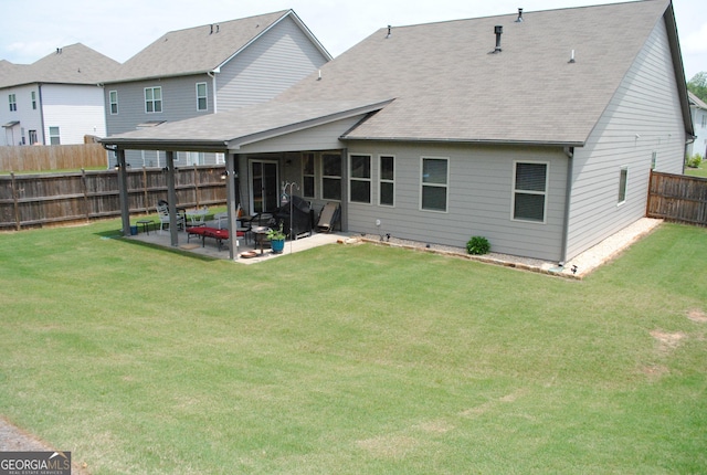 4605 Dandelion Way, Cumming, GA 30040 - back of house with roof with shingles, a patio area, and a fenced backyard