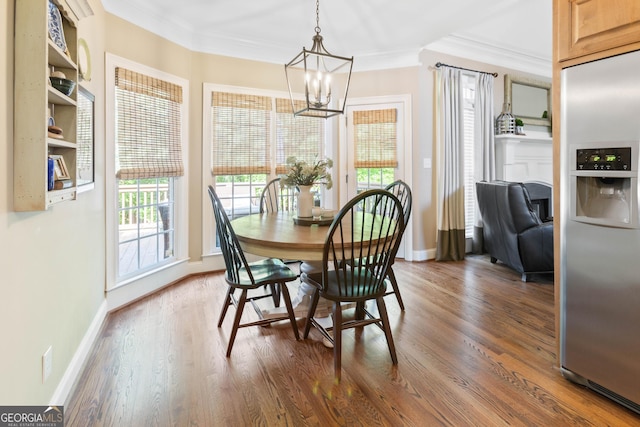1030 Spring Lake Dr, Bishop, GA 30621 - dining room with a chandelier, crown molding, and wood finished floors