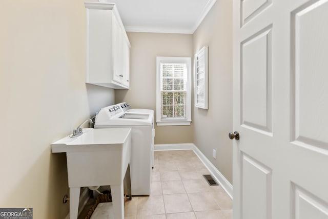 1030 Spring Lake Dr, Bishop, GA 30621 - washroom with cabinet space, independent washer and dryer, crown molding, and light tile patterned flooring