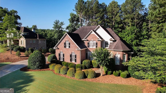 1030 Spring Lake Dr, Bishop, GA 30621 - view of front of house featuring brick siding and a front lawn