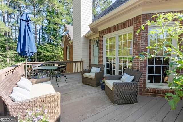 1030 Spring Lake Dr, Bishop, GA 30621 - wooden terrace featuring outdoor dining area