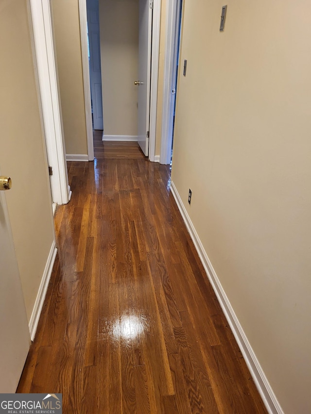 3211 Rockview Dr, Lithonia, GA 30038 - hall featuring dark wood-style floors