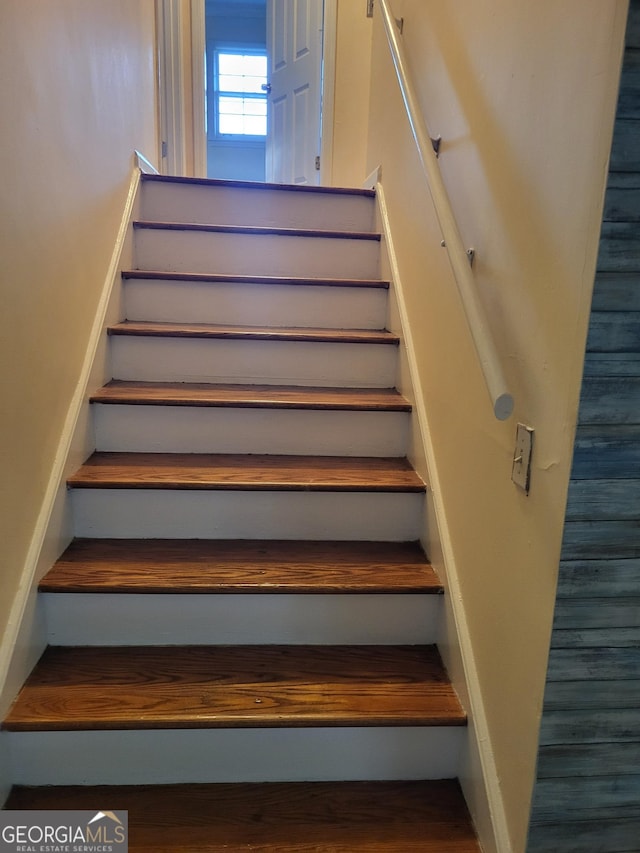 3211 Rockview Dr, Lithonia, GA 30038 - stairs with wood finished floors