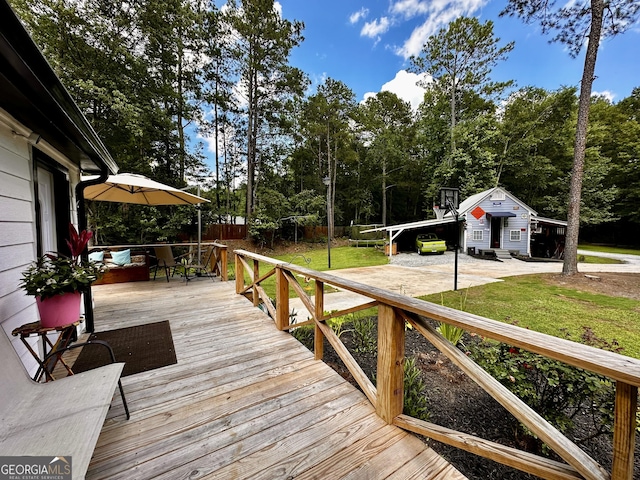 245 Clearwater Rd, Sharpsburg, GA 30277 - deck featuring view of scattered trees and a carport