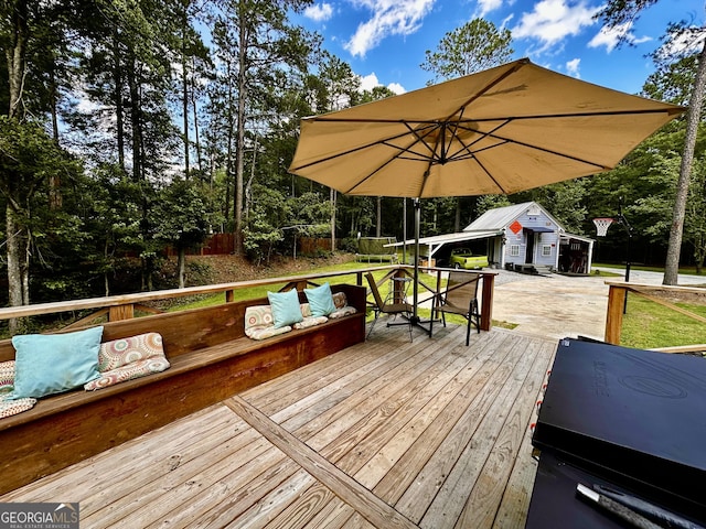 245 Clearwater Rd, Sharpsburg, GA 30277 - wooden deck with an outdoor structure and outdoor lounge area