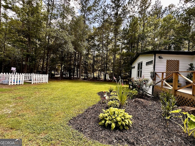 245 Clearwater Rd, Sharpsburg, GA 30277 - view of yard with a wooden deck