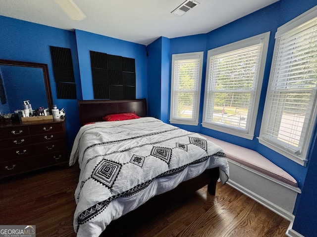 703 Overlook Pt, Woodstock, GA 30189 - bedroom with wood finished floors and baseboards