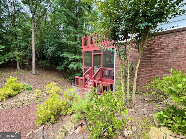 703 Overlook Pt, Woodstock, GA 30189 - view of yard featuring a sunroom