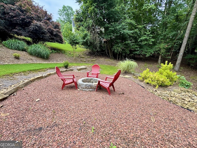 703 Overlook Pt, Woodstock, GA 30189 - view of yard with an outdoor fire pit