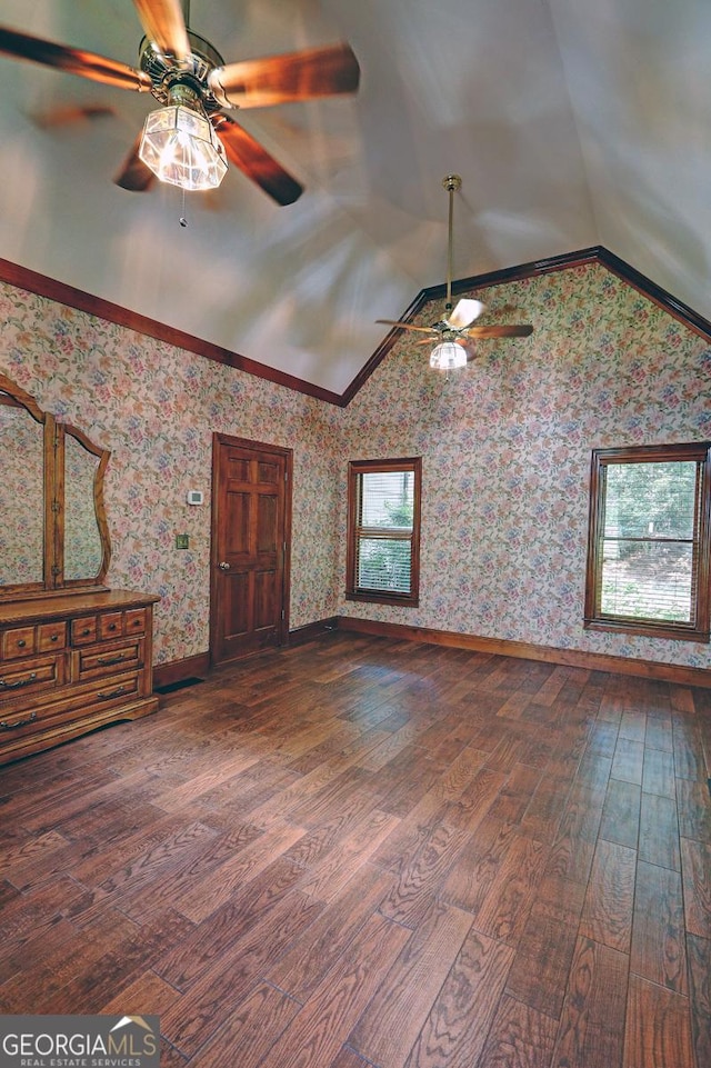 4393 Cannon Rd, Loganville, GA 30052 - unfurnished living room with ceiling fan, lofted ceiling, hardwood / wood-style floors, and wallpapered walls