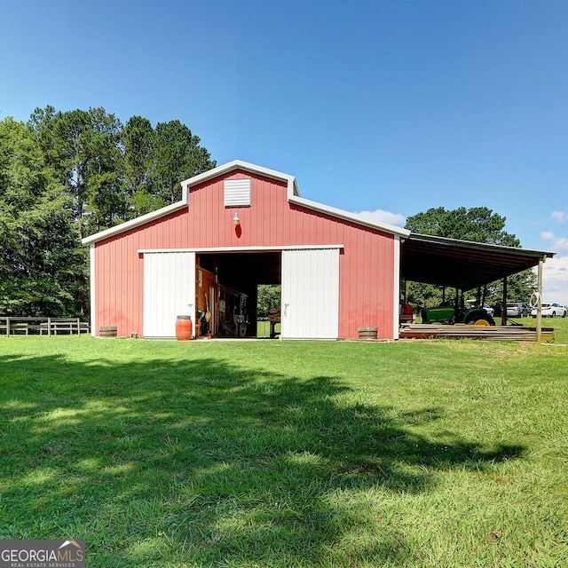 4393 Cannon Rd, Loganville, GA 30052 - view of pole building with a lawn