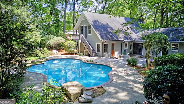 4393 Cannon Rd, Loganville, GA 30052 - outdoor pool with a patio and stairway