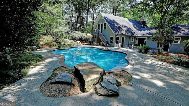 4393 Cannon Rd, Loganville, GA 30052 - outdoor pool with stairs, a patio, and a deck