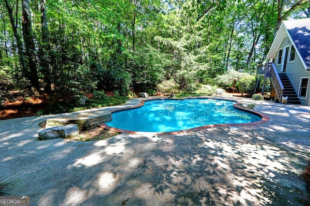 4393 Cannon Rd, Loganville, GA 30052 - swimming pool featuring stairs and a patio area